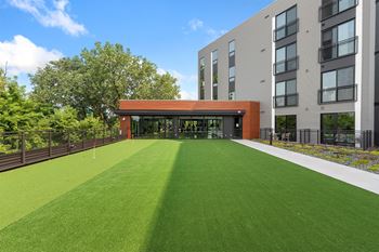a large lawn in front of a building